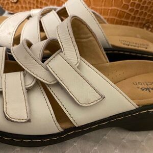 Sketcher tennis  plus Clark’s slip on sandals. Two for one. Excellent condition